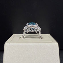 Load image into Gallery viewer, 18k White Gold Blue Zircon and Diamond Halo Ring

