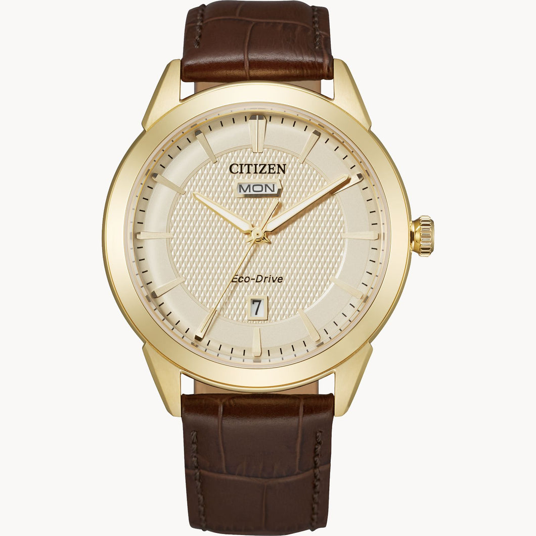 Gents Stainless Steel Citizen Eco-Drive Watch with a Gold Tone Bezel and Gold Tone Dial