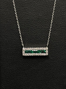 One Ladies 14k White Gold Emerald and Diamond Pendant on and adjustable 16"-18" 14k White Gold Chain