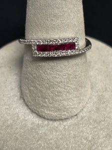 One Ladies 14k White Gold Ruby and Diamond Ring