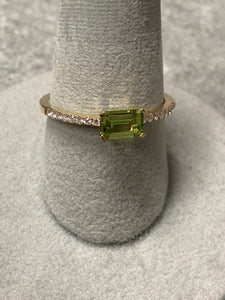 One Ladies 14k Yellow Gold Diamond and Peridot Ring