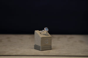 14k White Gold Diamond Halo and Blue Topaz Ring