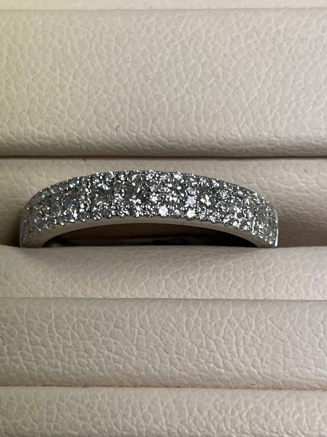 One Ladies 18k White Gold Triple Row Diamond Ring
