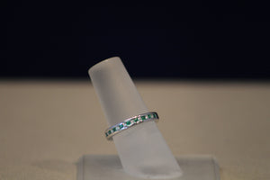 14k White Gold Alternating Round Diamond and Princess Cut Emerald Channel Set Band