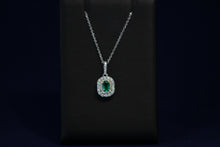 Load image into Gallery viewer, 14k White Gold Oval Emerald and Two Tone Diamond Pendant

