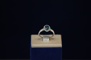 14k White Gold Oval Shaped Blue Zircon and Diamond Ring